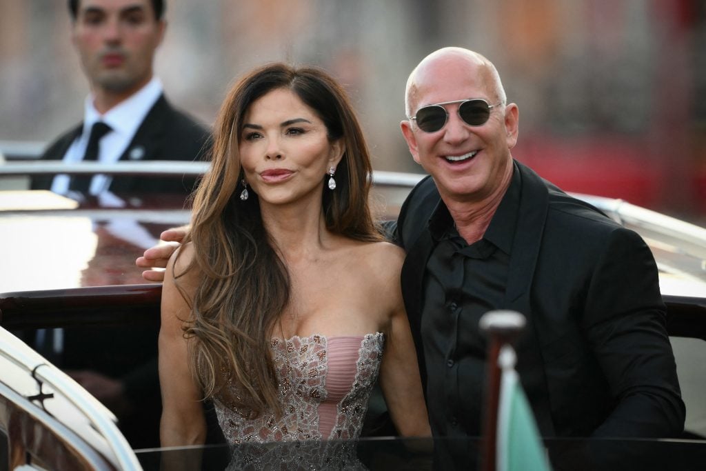 Amazon's founder Jeff Bezos and spouse Lauren Sanchez Bezos leave the Aman Hotel on the third day of their wedding festivities, in Venice on June 28, 2025. 