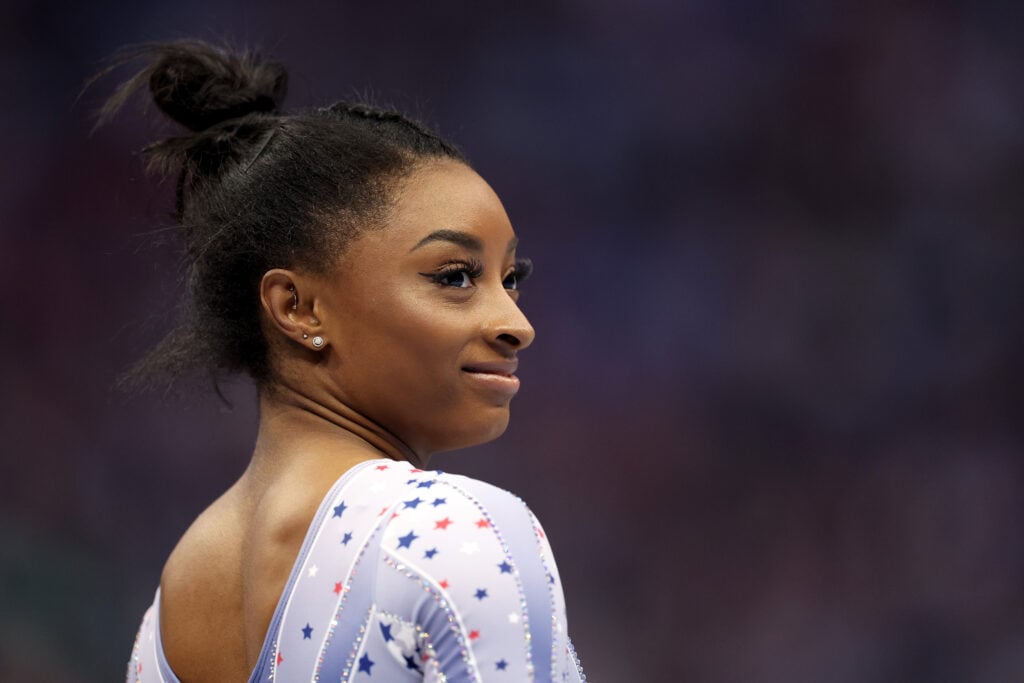 Simone Biles smiles on Day Two of the 2024 U.S. Olympic Team Gymnastics Trials at Target Center on June 28, 2024 in Minneapolis, Minnesota. 