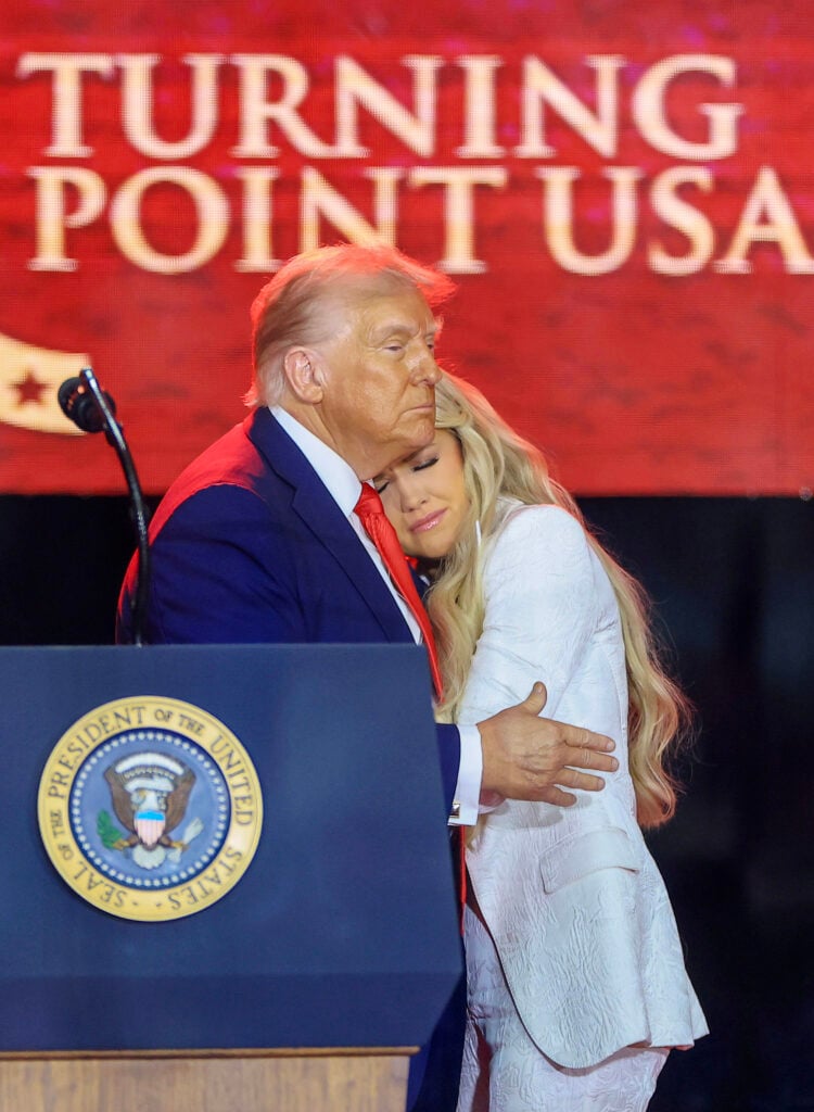 GLENDALE, ARIZONA - Erika Kirk joins U.S. President Donald Trump onstage during the memorial service for political activist Charlie Kirk at State Farm Stadium on September 21, 2025 in Glendale, Arizona. 