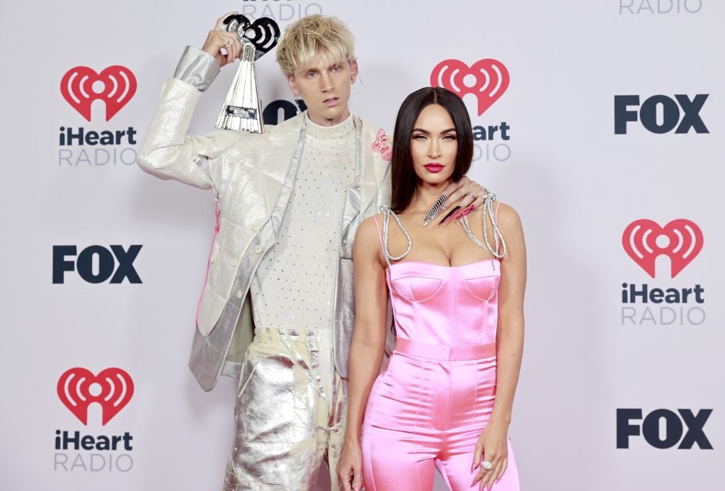 Machine Gun Kelly, winner of the Alternative Rock Album of the Year award for 'Tickets To My Downfall,â and Megan Fox attend the 2021 iHeartRadio Music Awards at The Dolby Theatre in Los Angeles, California, which was broadcast live on FOX on May 27, 2021.