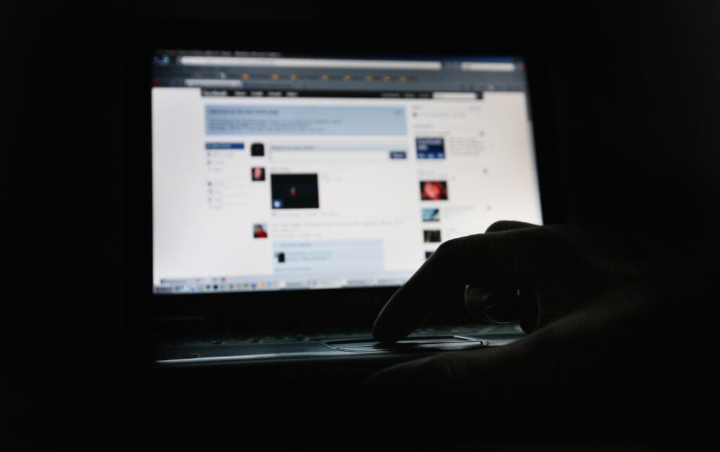 In this photo illustration the Social networking site Facebook is displayed on a laptop screen.