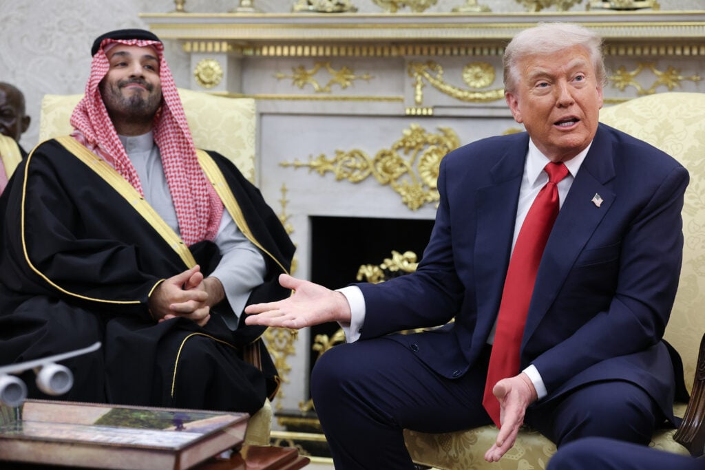 U.S. President Donald Trump (R) responds to a question where Crown Prince and Prime Minister Mohammed bin Salman of Saudi Arabia was asked about the death of Saudi journalist Jamal Ahmad Hamza Khashoggi during a bilateral meeting in the Oval Office of the White House on November 18, 2025 in Washington, DC.