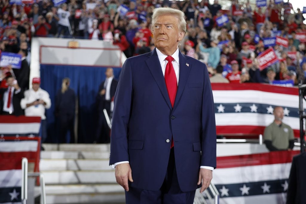Republican presidential nominee, former U.S. President Donald Trump takes the stage during a campaign rally at the J.S. Dorton Arena on November 04, 2024 in Raleigh, North Carolina. 