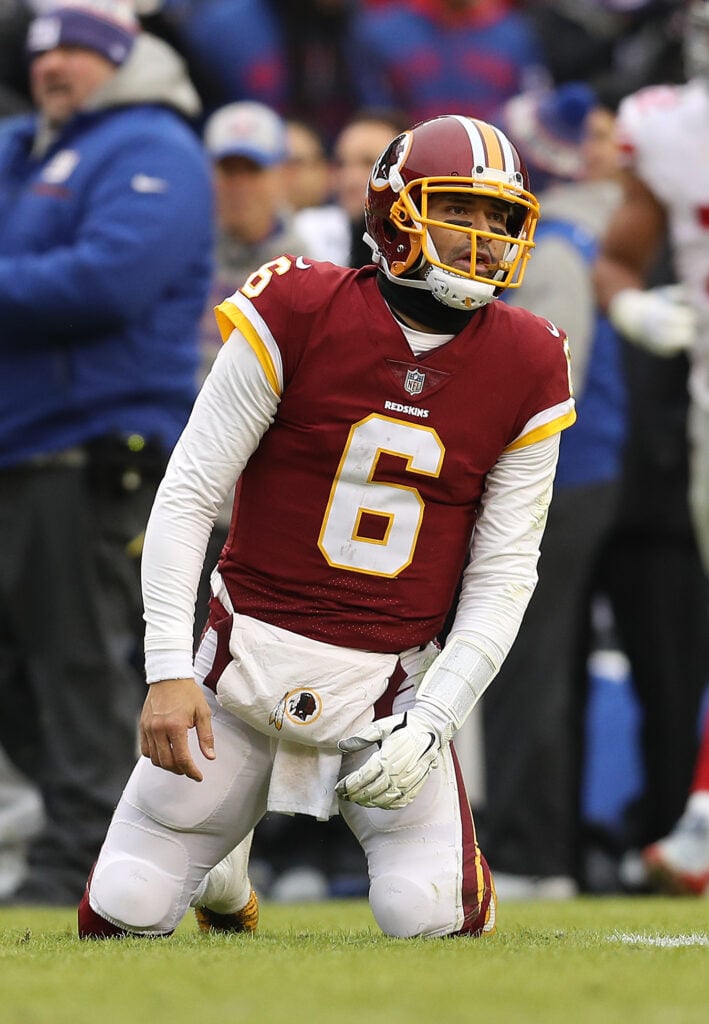 Quarterback Mark Sanchez #6 of the Washington Redskins reacts after an interception in the second quarter against the New York Giants at FedExField on December 9, 2018 in Landover, Maryland. 