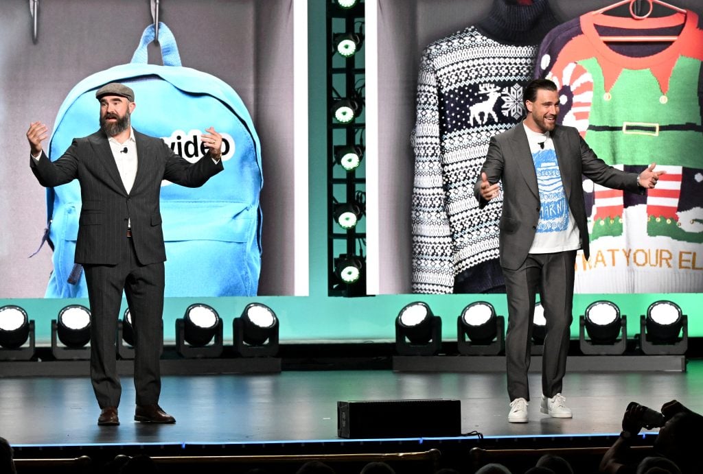 Jason Kelce and Travis Kelce onstage during Amazon's Upfront 2025 Presentation at Beacon Theatre on May 12, 2025 in New York City. 