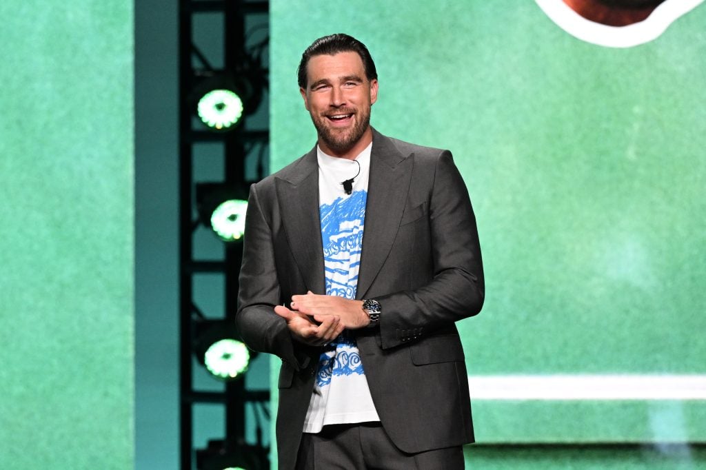 Travis Kelce speaks onstage during Amazon's Upfront 2025 Presentation at Beacon Theatre on May 12, 2025 in New York City. 