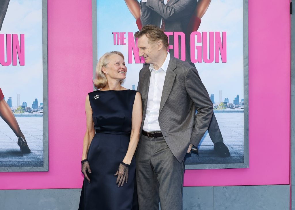 Pamela Anderson and Liam Neeson attend The Naked Gun New York Premiere on July 28, 2025 in New York City.