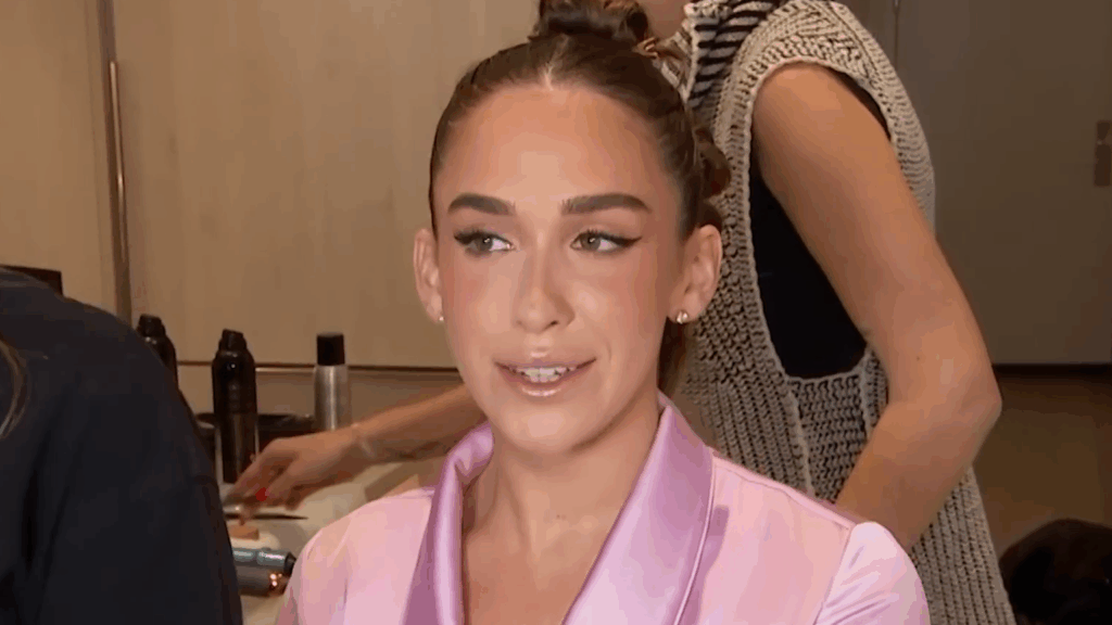 Ariana Bierman in a bubblegum pink robe.