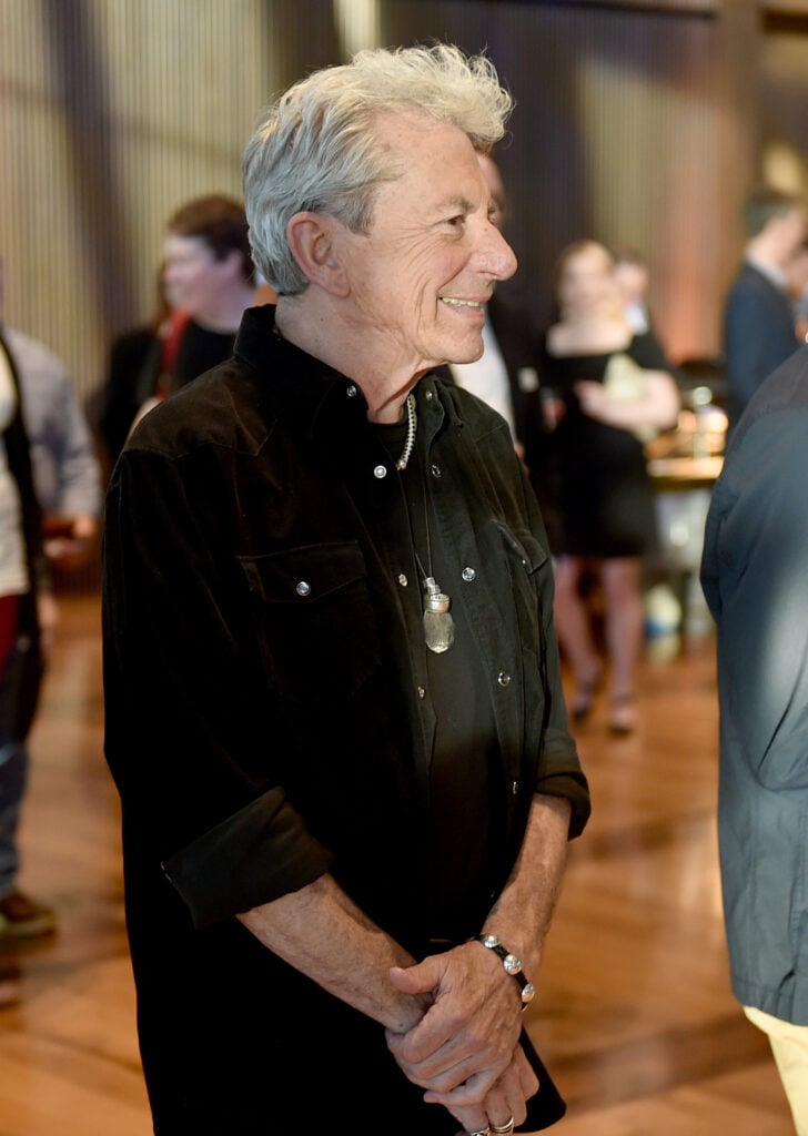 Artist Joe Ely waits to go onstage during the CMHOF Outlaws and Armadillos VIP Opening Reception on May 24, 2018 in Nashville, Tennessee. 