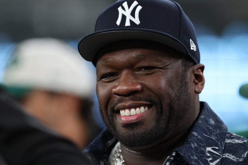 Rapper 50 Cent is seen on the sidelines prior to the game between the Buffalo Bills and the New York Jets  at MetLife Stadium on October 14, 2024 in East Rutherford, New Jersey. 