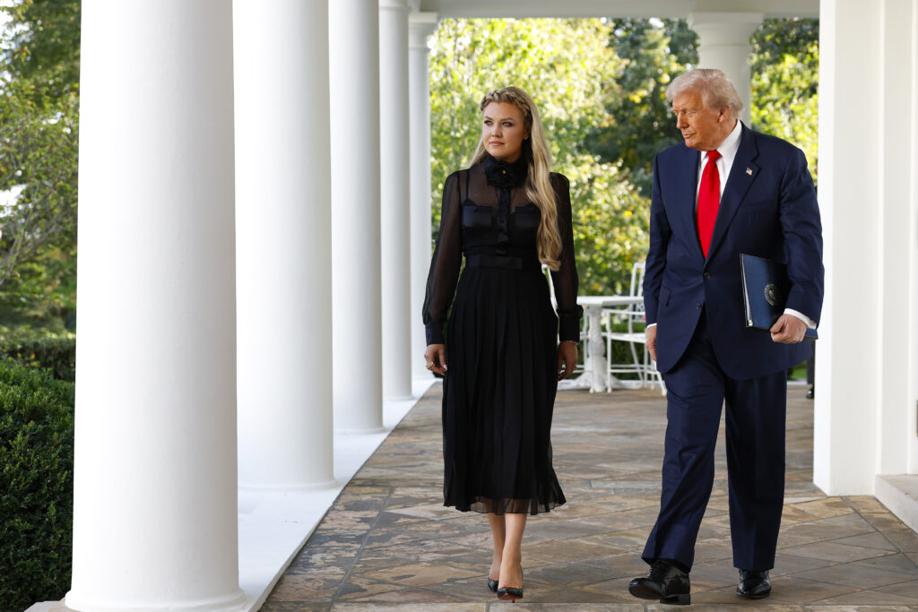 Erika Kirk (L), wife of late conservative activist Charlie Kirk, arrives with U.S. President Donald Trump as he posthumously awards the Presidential Medal of Freedom to Charlie Kirk during a ceremony in the Rose Garden of the White House on October 14, 2025 in Washington, DC. 