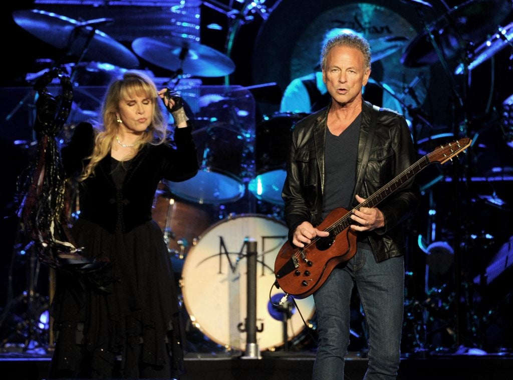 Singer Stevie Nicks and musician Lindsey Buckingham of Fleetwood Mac perform at The Staples Center on July 3, 2013 in Los Angeles, California. 