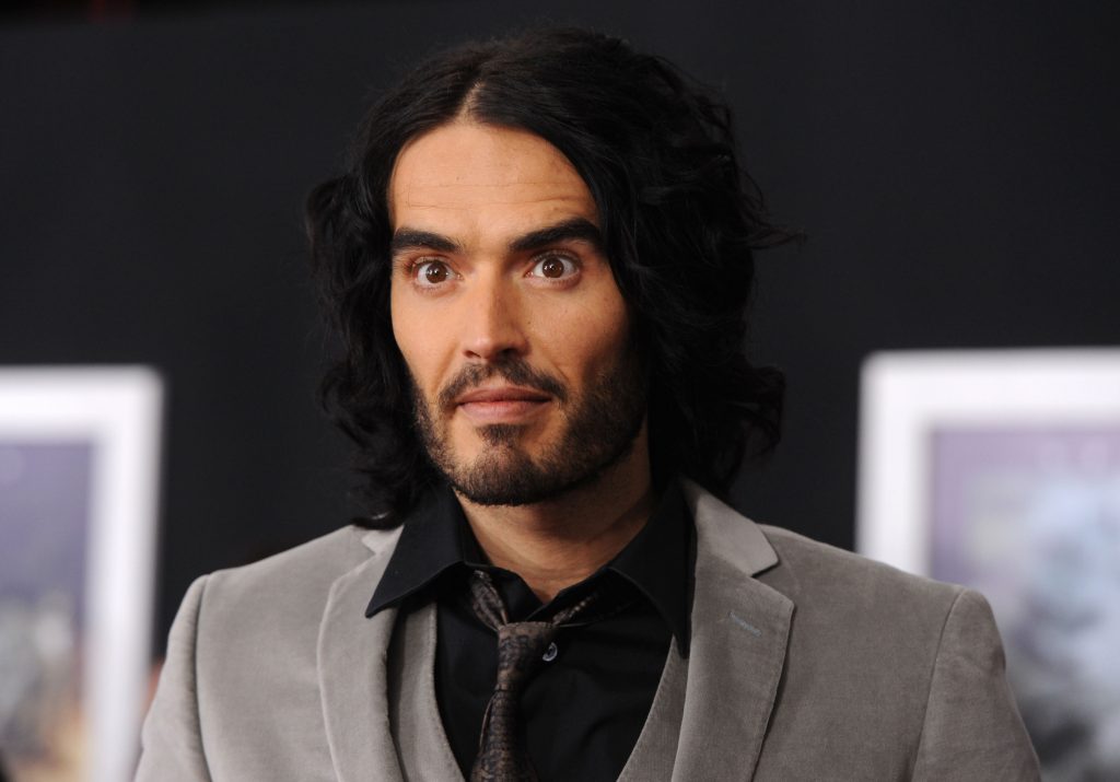 Singer Katy Perry and actor Russell Brand arrive at the premiere of Touchstone Pictures and Miramax Films' 'The Tempest' at the El Capitan Theatre on December 6, 2010 in Los Angeles, California.  