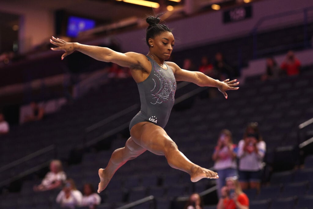 Simone Biles warms up prior to the start of Day Two of the 2024 U.S. Olympic Team Gymnastics Trials at Target Center on June 28, 2024 in Minneapolis, Minnesota. 