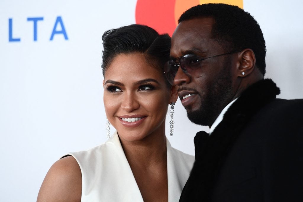Singer and model Cassie Ventura and Rap mogul P Diddy (aka Sean Combs) arrive for the traditionnal Clive Davis party on the eve of the 60th Annual Grammy Awards on January 28, 2018, in New York. 