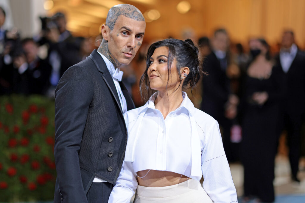 Travis Barker and Kourtney Kardashian attend The 2022 Met Gala Celebrating In America: An Anthology of Fashion at The Metropolitan Museum of Art on May 02, 2022 in New York City.