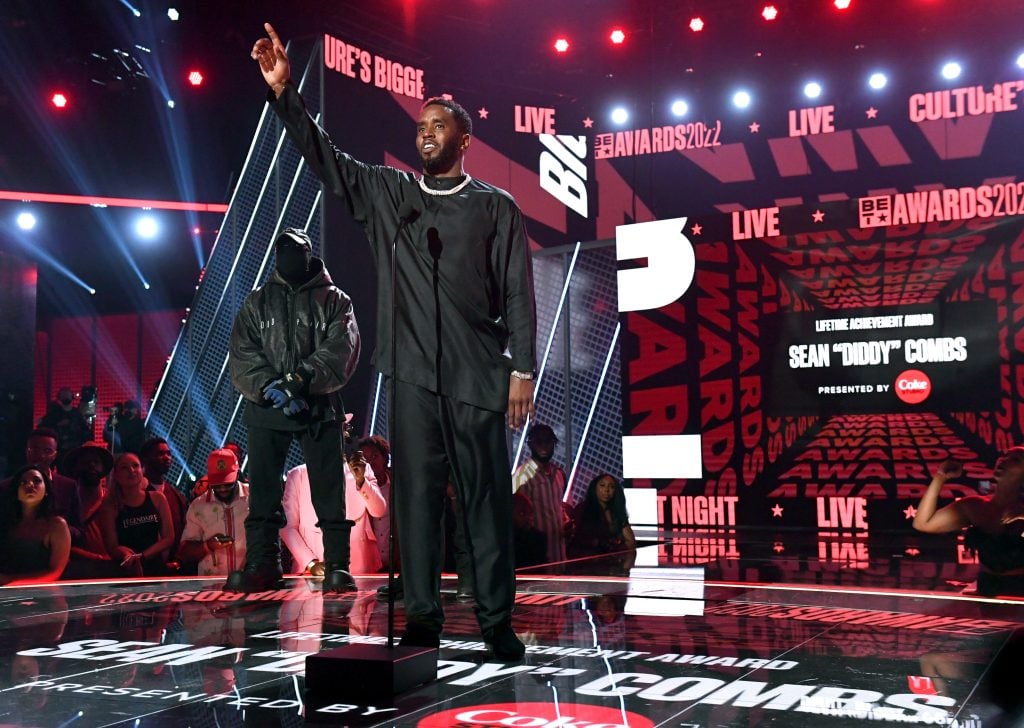 Diddy and Kanye West hang out together in 2022.