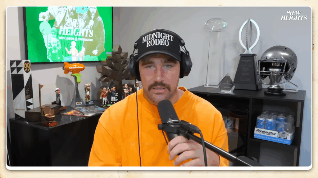 Travis Kelce with an inadvisable mustache on his podcast.