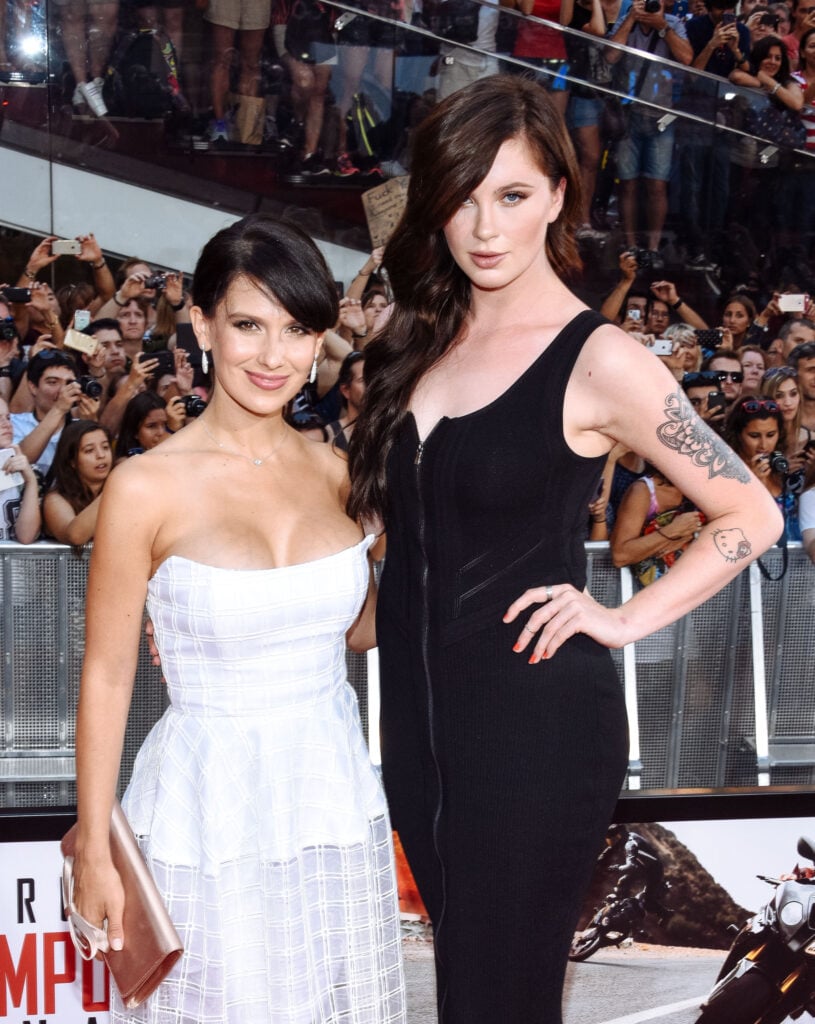 Hilaria Thomas (L) and Ireland Baldwin attend the Mission Impossible - Rogue Nation New York Premiere at Duffy Square in Times Square on July 27, 2015 in New York City.  