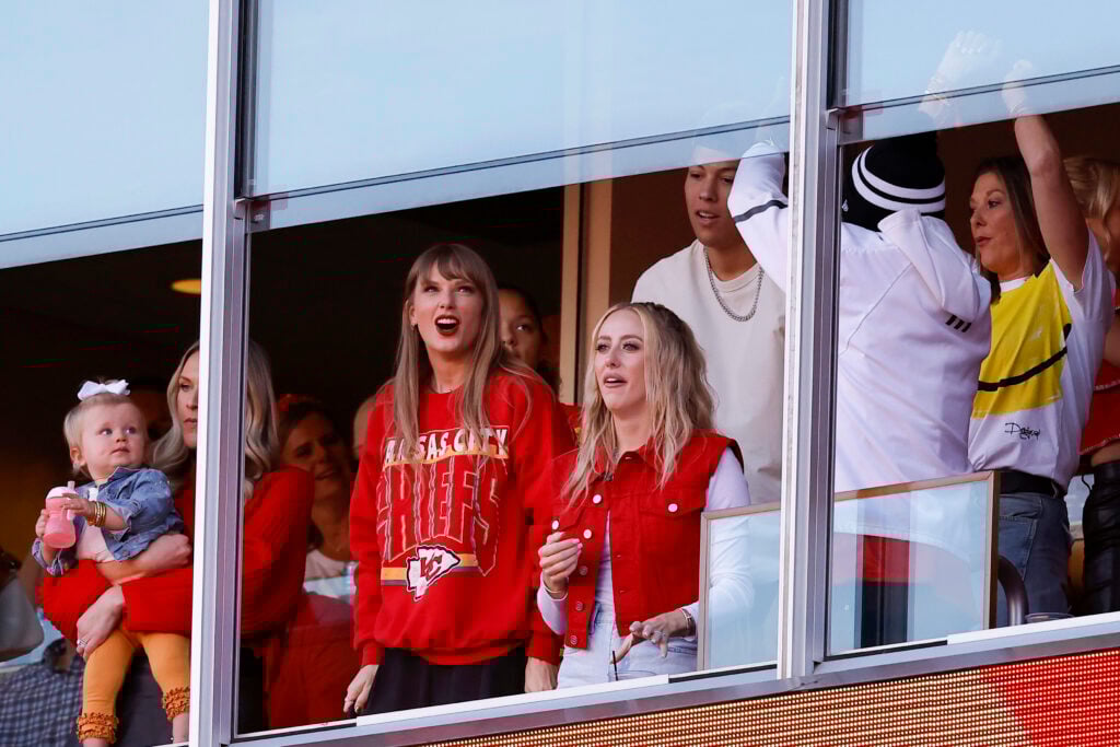 Taylor Swift and Brittany Mahomes cheer on the Kansas City Chiefs from a luxury box.