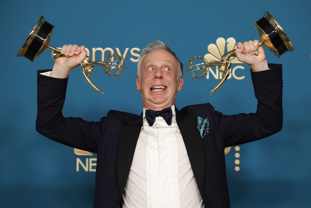 Mike White wields two Emmy Awards in September of 2022.