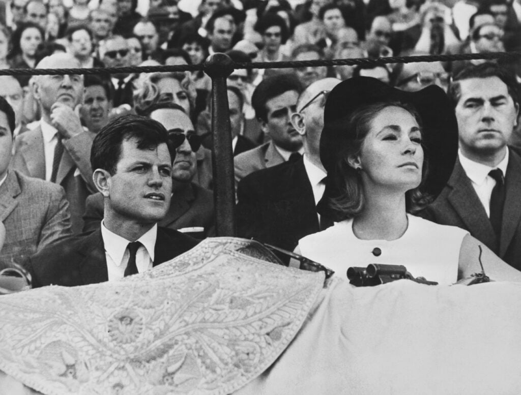 US Senator Ted Kennedy watches a bullfight in Seville with his wife Joan Bennett Kennedy, 21st April 1965. 