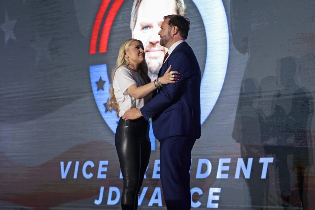 US Vice President JD Vance (R) greets Erika Kirk, Charlie Kirk's widow, during a Turning Point USA event at the University of Mississippi, in Oxford, Mississippi, October 29, 2025. 