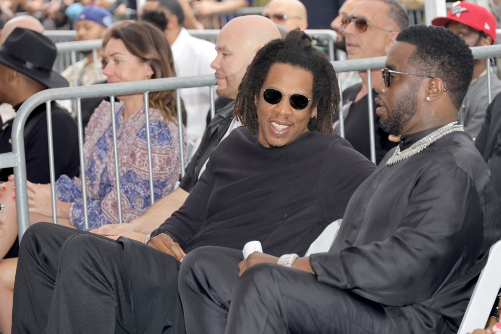 Jay-Z and Sean Combs attend the Hollywood Walk of Fame Star Ceremony for DJ Khaled on April 11, 2022 in Hollywood, California. 