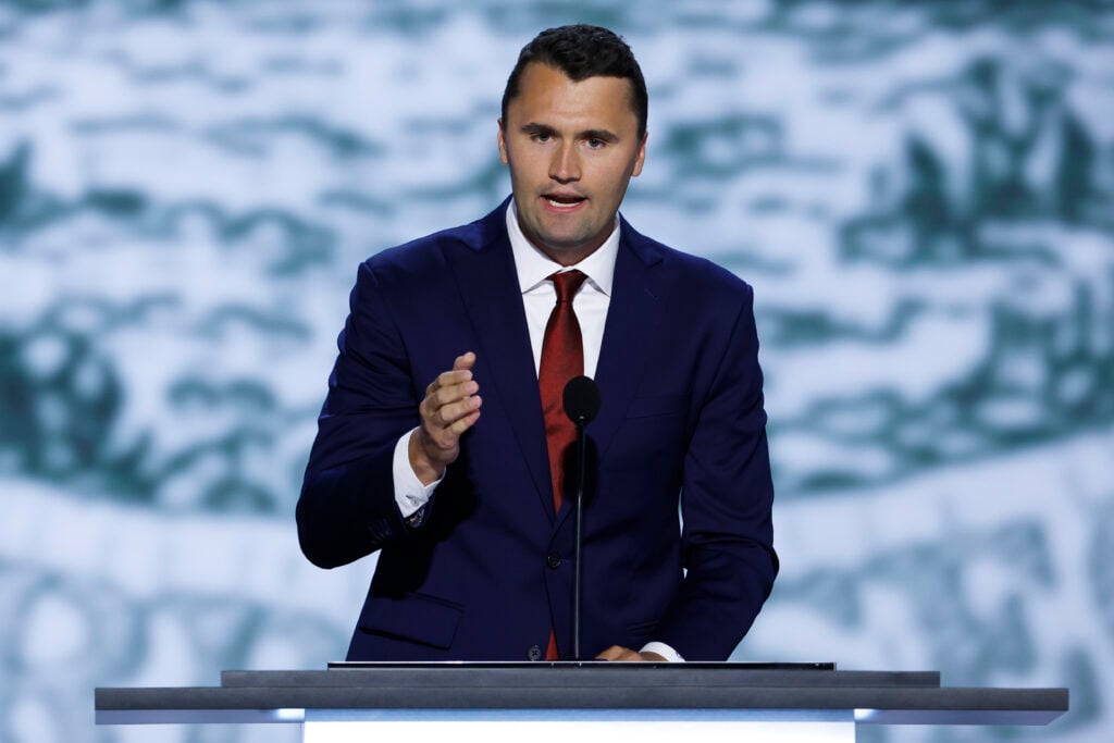 CEO of Turning Point USA Charlie Kirk speaks on stage on the first day of the Republican National Convention at the Fiserv Forum on July 15, 2024 in Milwaukee, Wisconsin. 