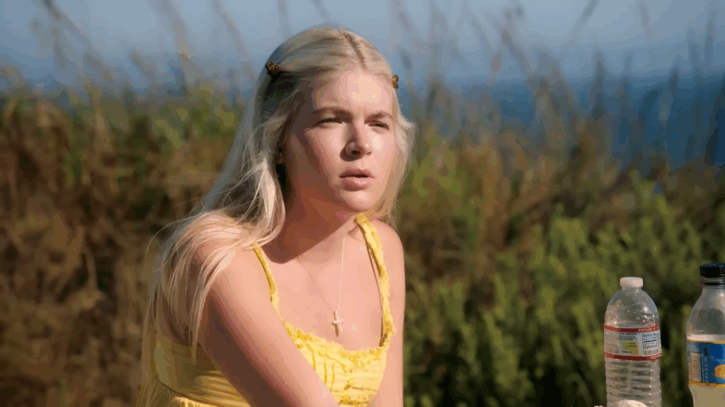 Lola Sheen at a picnic table.