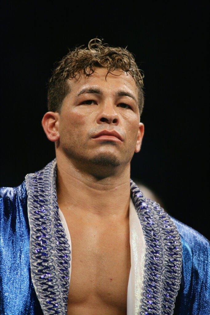 Arturo Gatti looks on against Floyd Mayweather Jr. during the WBC Super Lightweight Championship fight at Boardwalk Hall on June 25, 2005 in Atlantic City, New Jersey. 