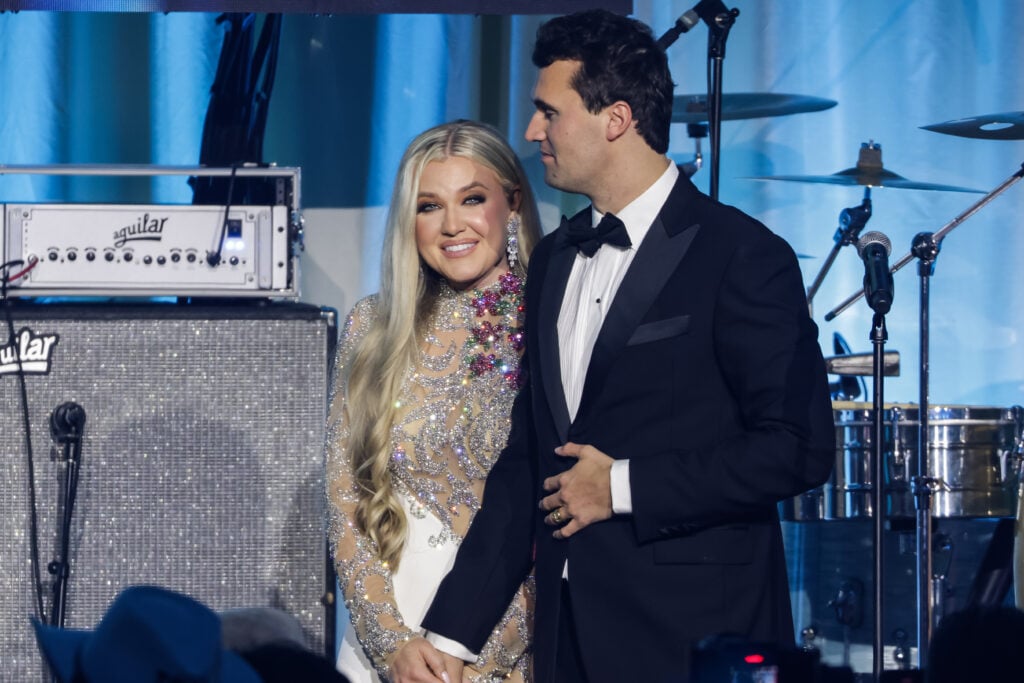 Charlie Kirk (R) and and his wife Erika Lane Frantzve (L) on stage during the Turning Point USA Inaugural-Eve Ball at the Salamander Hotel on January 19, 2025 in Washington, DC. 