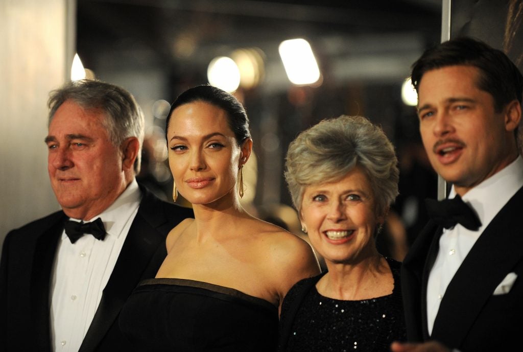 Actors Angelina Jolie (2L) and Brad Pitt (R) arrive with Brad Pitt's parents, Bill and Jane Pitt for the Los Angeles premiere of The Curious Case of Benjamin Button, December 8, 2008, in Westwood, California.