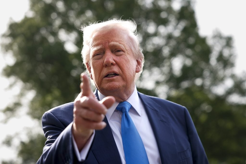 U.S. President Donald Trump speaks to the media as he departs the White House on April 25, 2025 in Washington, DC. President Trump and the first lady are traveling to Rome to attend the funeral of Pope Francis.
