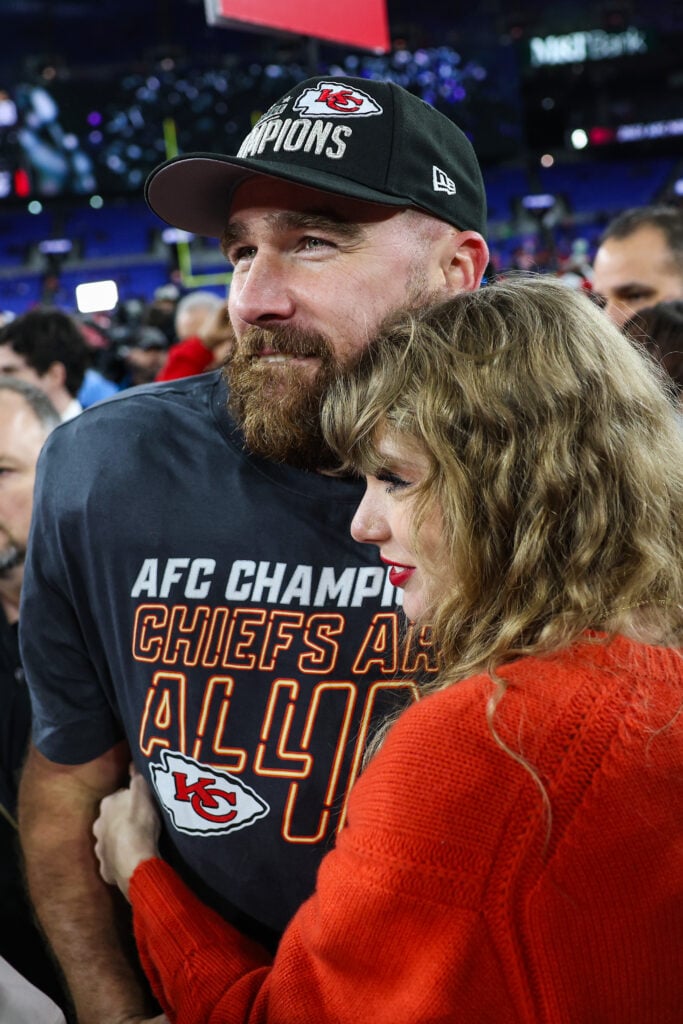 Travis Kelce #87 of the Kansas City Chiefs celebrates with Taylor Swift after defeating the Baltimore Ravens in the AFC Championship Game at M&T Bank Stadium on January 28, 2024 in Baltimore, Maryland.  