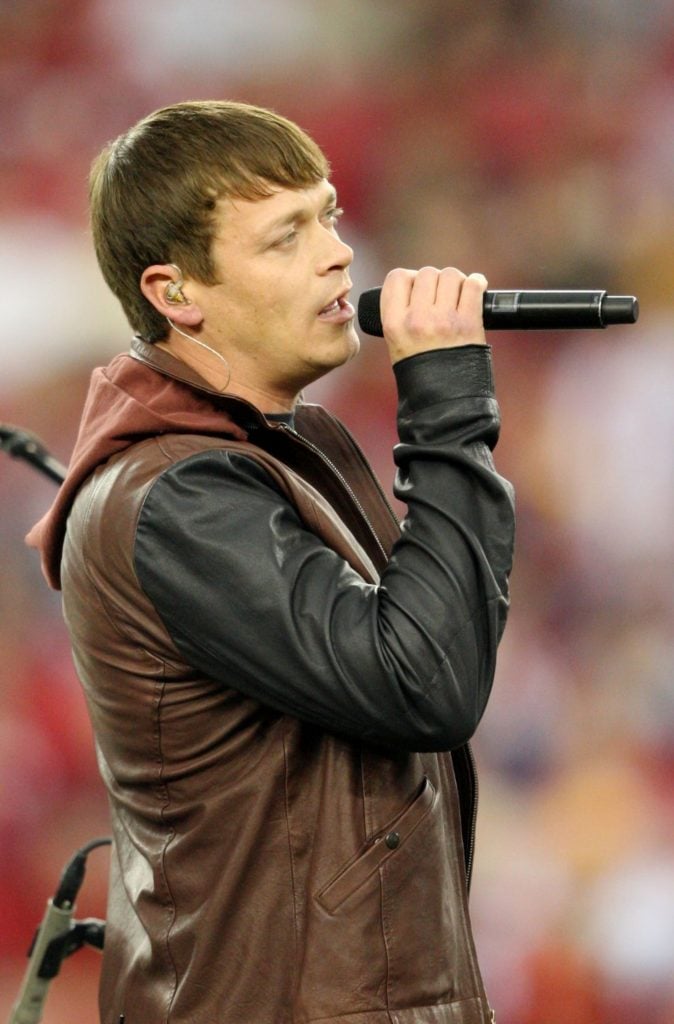 Brad Arnold of the band 3 Doors Down performs at halftime during the 2010 NFC wild-card playoff game between the Green Bay Packers and the Arizona Cardinals at University of Phoenix Stadium on January 10, 2010 in Glendale, Arizona. 