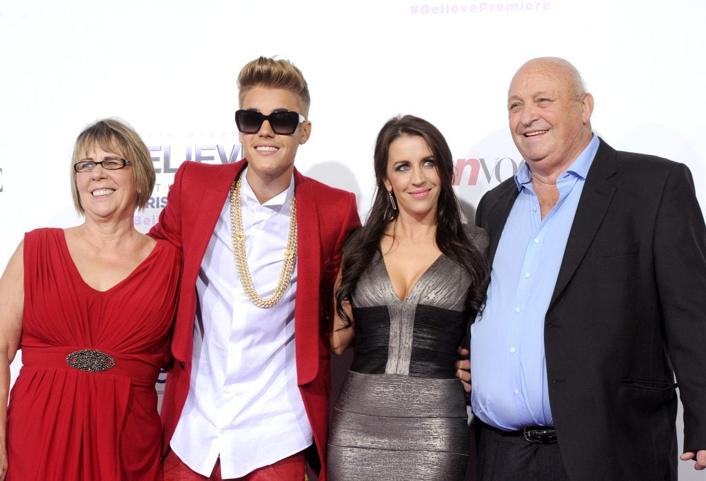 Diane Dale, singer/producer Justin Bieber, Pattie Mallette and Bruce Dale arrive at the premiere Of Open Road Films' Justin Bieber's Believe at Regal Cinemas L.A. Live on December 18, 2013 in Los Angeles, California. Diane Dale, singer/producer Justin Bieber, Pattie Mallette and Bruce Dale arrive at the premiere Of Open Road Films' Justin Bieber's Believe at Regal Cinemas L.A. Live on December 18, 2013 in Los Angeles, California.