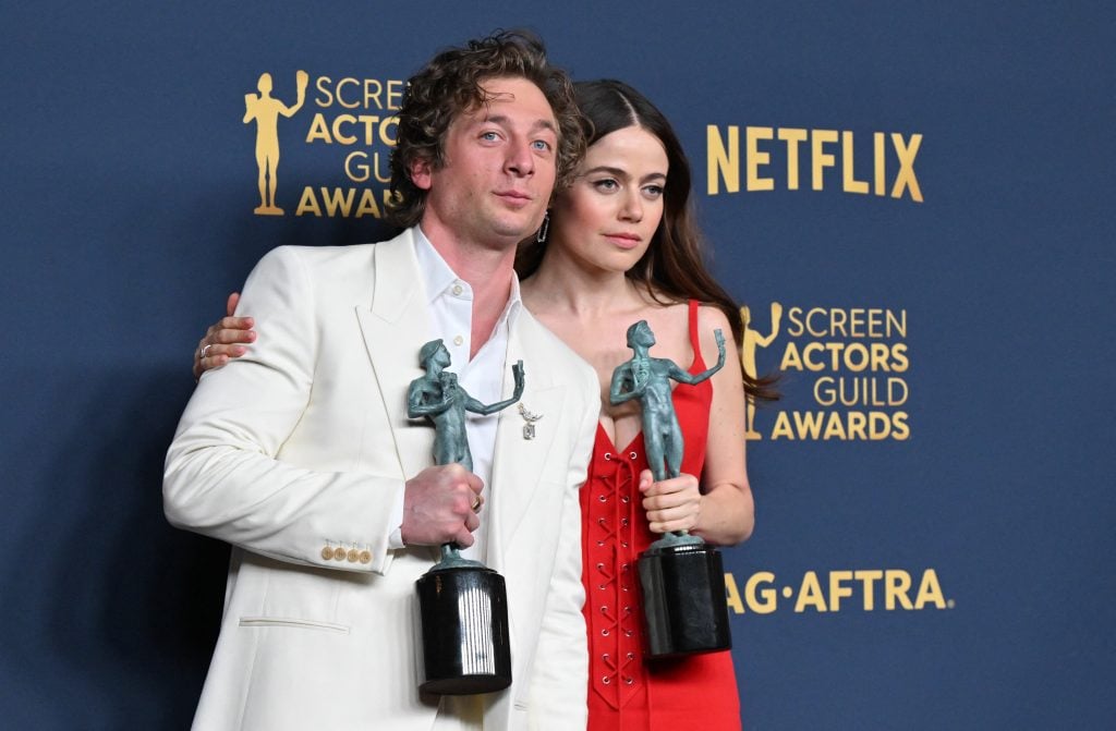 US actor Jeremy Allen White and actress Molly Gordon pose with the awards for Outstanding Performance by a Male Actor in a Comedy Series (Allen White) and Outstanding Performance by an Ensemble in a Comedy Series for The Bear during the 30th Annual Screen Actors Guild awards at the Shrine Auditorium in Los Angeles, February 24, 2024.  US actor Jeremy Allen White and actress Molly Gordon pose with the awards for Outstanding Performance by a Male Actor in a Comedy Series (Allen White) and Outstanding Performance by an Ensemble in a Comedy Series for The Bear during the 30th Annual Screen Actors Guild awards at the Shrine Auditorium in Los Angeles, February 24, 2024.