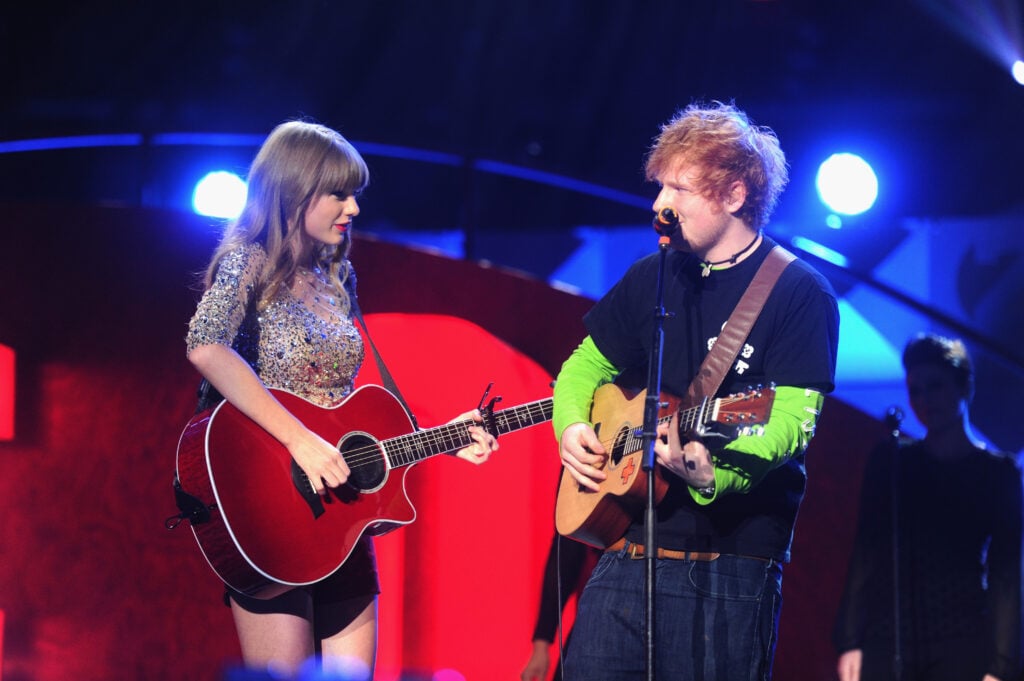 Taylor Swift and Ed Sheeran perform onstage during Z100's Jingle Ball 2012, presented by Aeropostale, at Madison Square Garden on December 7, 2012 in New York City.   Taylor Swift and Ed Sheeran perform onstage during Z100's Jingle Ball 2012, presented by Aeropostale, at Madison Square Garden on December 7, 2012 in New York City.