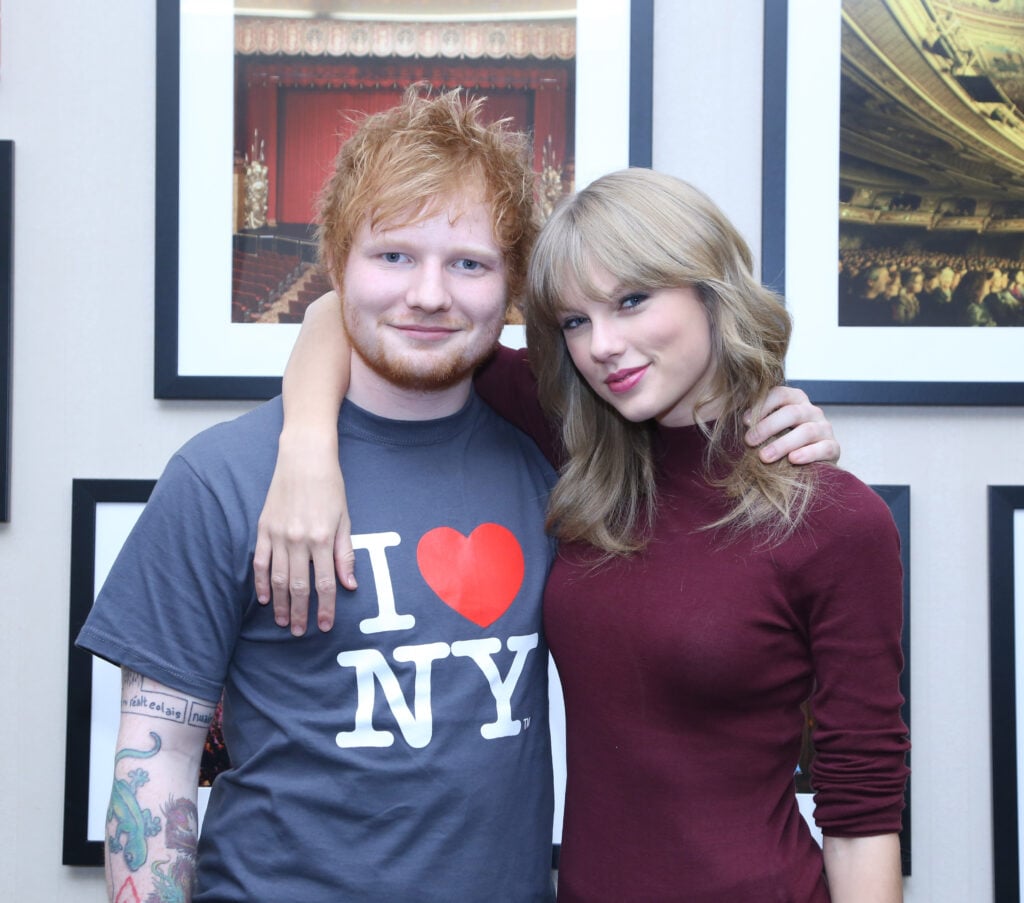 Ed Sheeran poses with Taylor Swift backstage before his sold-out show at Madison Square Garden Arena on November 1, 2013 in New York City.   Ed Sheeran poses with Taylor Swift backstage before his sold-out show at Madison Square Garden Arena on November 1, 2013 in New York City.