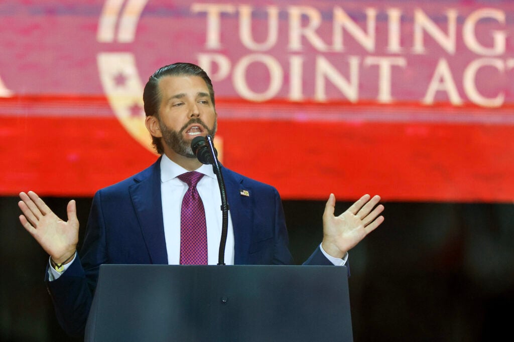 Donald Trump Jr. speaks during the memorial service for political activist Charlie Kirk at State Farm Stadium on September 21, 2025 in Glendale, Arizona.  Donald Trump Jr. speaks during the memorial service for political activist Charlie Kirk at State Farm Stadium on September 21, 2025 in Glendale, Arizona.