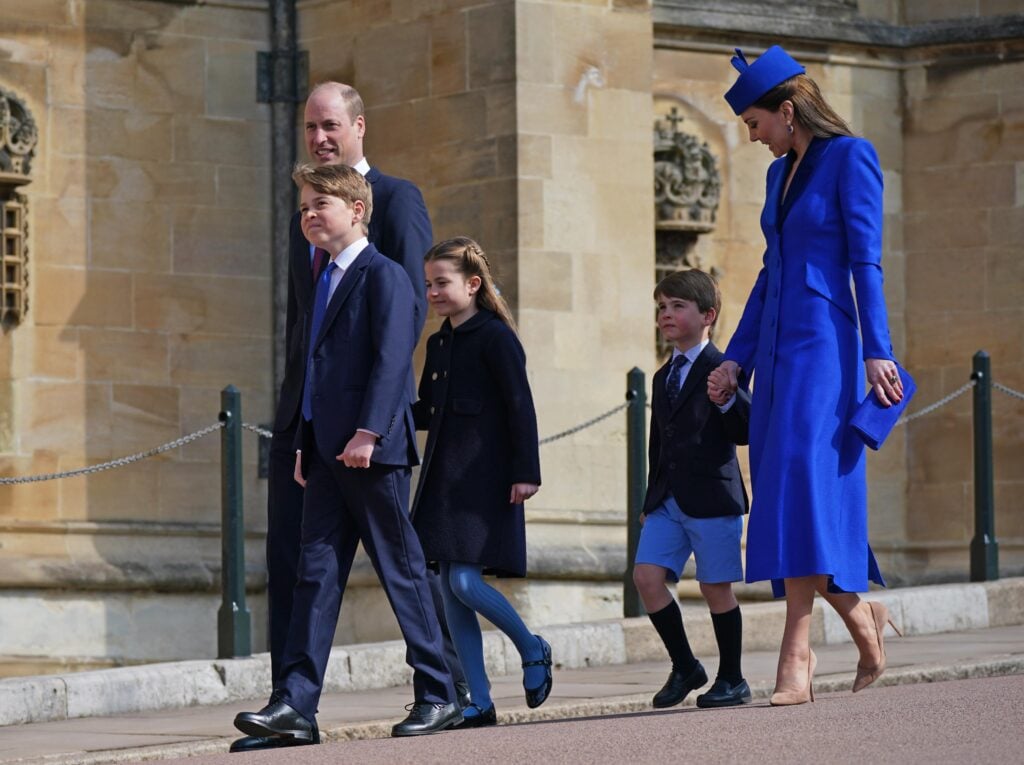 Prince George of Wales, Prince William, Prince of Wales, Princess Charlotte of Wales, Prince Louis of Wales and Catharine, Princess of Wales attend the Easter Mattins Service at Windsor Castle on April 9, 2023 in Windsor, England.