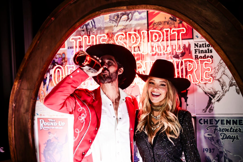 Ryan Bingham and Hassie Harrison attend the Bingham's Bourbon NFR After Party at Inspire at the Wynn on December 07, 2023 in Las Vegas, Nevada.