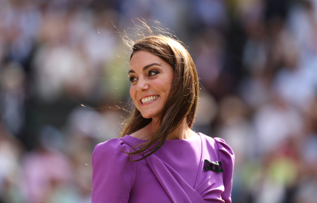 Catherine, Princess of Wales, Patron of The AELTC smiles prior to presenting Carlos Alcaraz of Spain with his trophy following victory against Novak Djokovic of Serbia in the Gentlemen's Singles Final during day fourteen of The Championships Wimbledon 2024 at All England Lawn Tennis and Croquet Club on July 14, 2024 in London, England. 