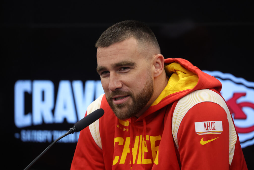 Travis Kelce talks to the media during a Kansas City press conference at DFB Campus on November 03, 2023 in Frankfurt am Main, Germany.