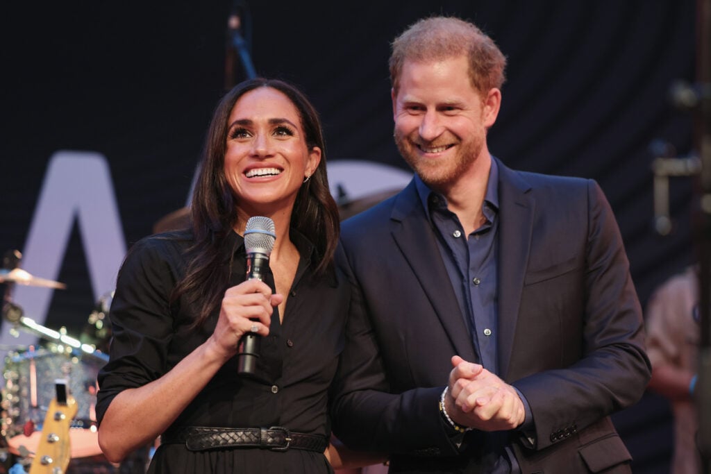 Prince Harry, Duke of Sussex and Meghan, Duchess of Sussex speak on stage at the Friends @ Home Event at the Station Airport during day three of the Invictus Games DÃ¼sseldorf 2023 on September 12, 2023 in Duesseldorf, Germany. 