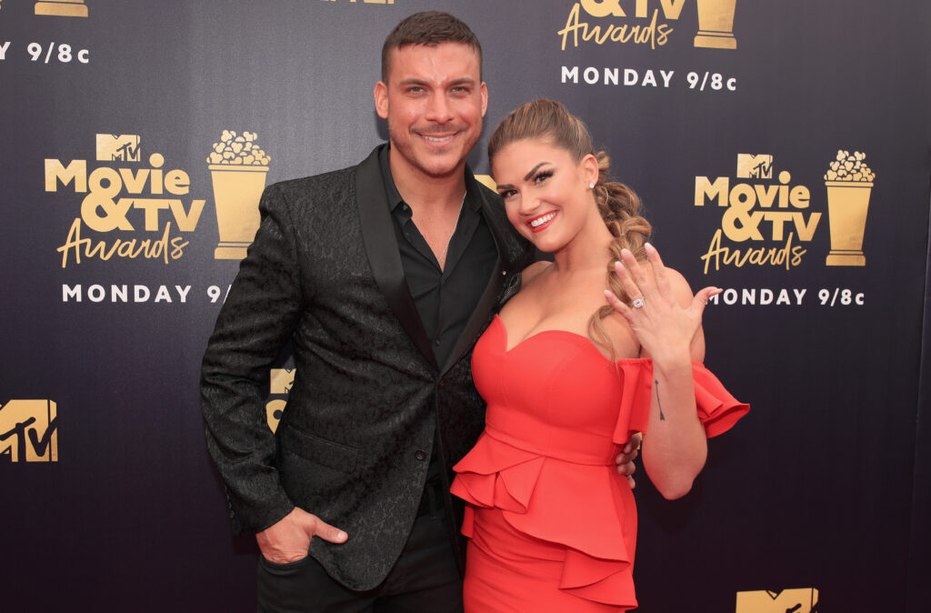 Jax Taylor and Brittany Cartwright attend the 2018 MTV Movie And TV Awards at Barker Hangar on June 16, 2018 in Santa Monica, California.  