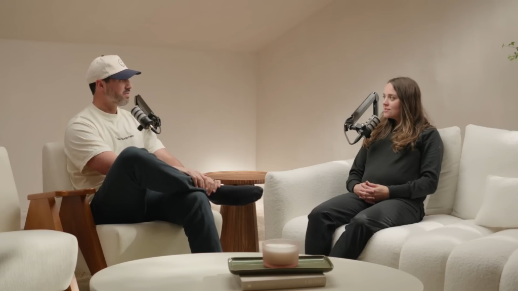 Jeremy Vuolo and Jinger Duggar sit for their podcast in December 2024.