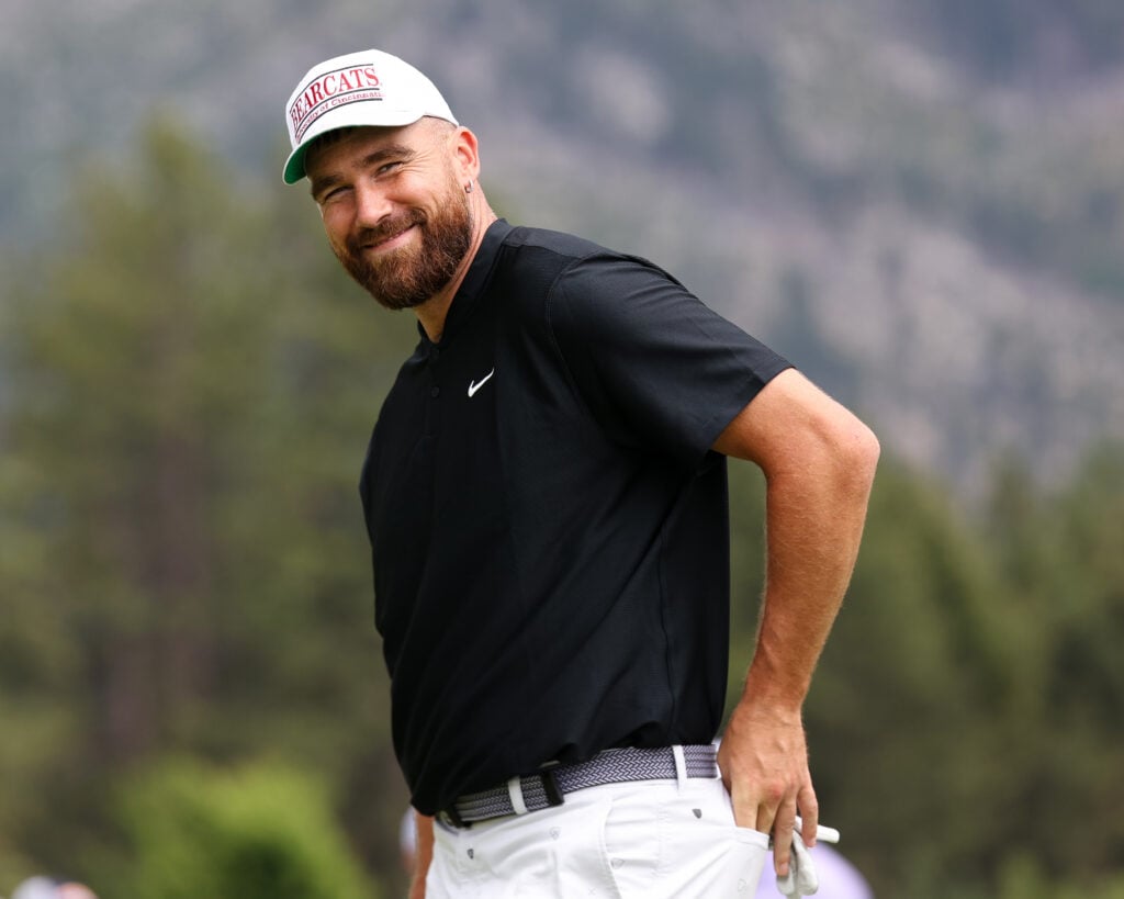 Travis Kelce on a golf course in July of 2024.