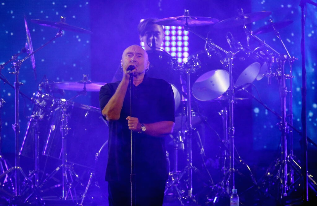 Phil Collins in August 2016, in a royal purple haze.